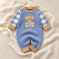 The Everyday Knit Baby Romper studio photograph on ivory linen