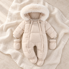 The Fleece Hooded Zip Romper studio photograph on ivory linen