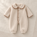 The Fleece-Lined Collared Romper studio photograph on ivory linen