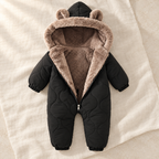 The Fleece-Lined Hooded Romper studio photograph on ivory linen