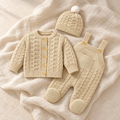 The Knit Romper & Hat Outfit studio photograph on ivory linen