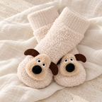The Little Pup Grip Socks studio photograph on ivory linen