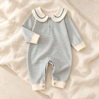 The Sailor Stripe Cotton Romper studio photograph on ivory linen