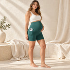 Over-Bump Maternity Biker Shorts with Pockets, green, worn or used by an adult model