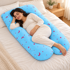 Full-body pregnancy pillow — Blue Moon Print, used by an adult woman on cream linen