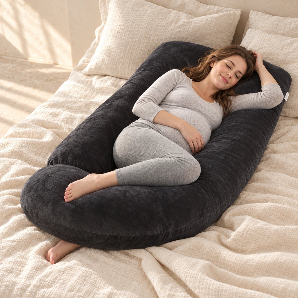 Tots & Moms U-shaped maternity pillow — Black, used by an adult model