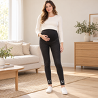 Tots & Moms maternity jeans — Black — Outline Cat, worn by an adult model