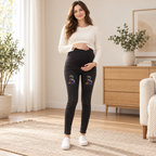 Tots & Moms maternity jeans — Black — Rainbow Teddy, worn by an adult model