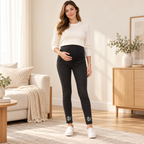 Tots & Moms maternity jeans — Black — Cherub, worn by an adult model