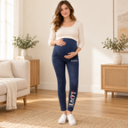 Tots & Moms maternity jeans — Indigo — Floral Love, worn by an adult model